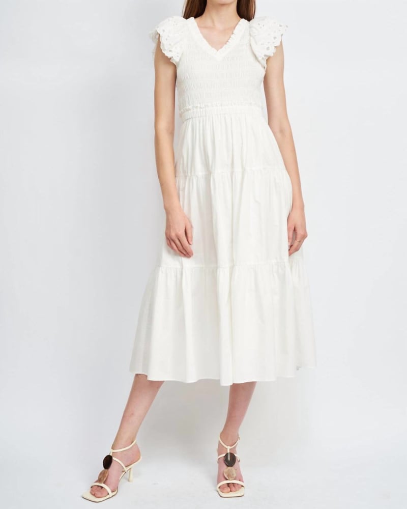 Front of a model wearing a size L Alana Smocked Midi Dress In White in White by En Saison. | dia_product_style_image_id:351795
